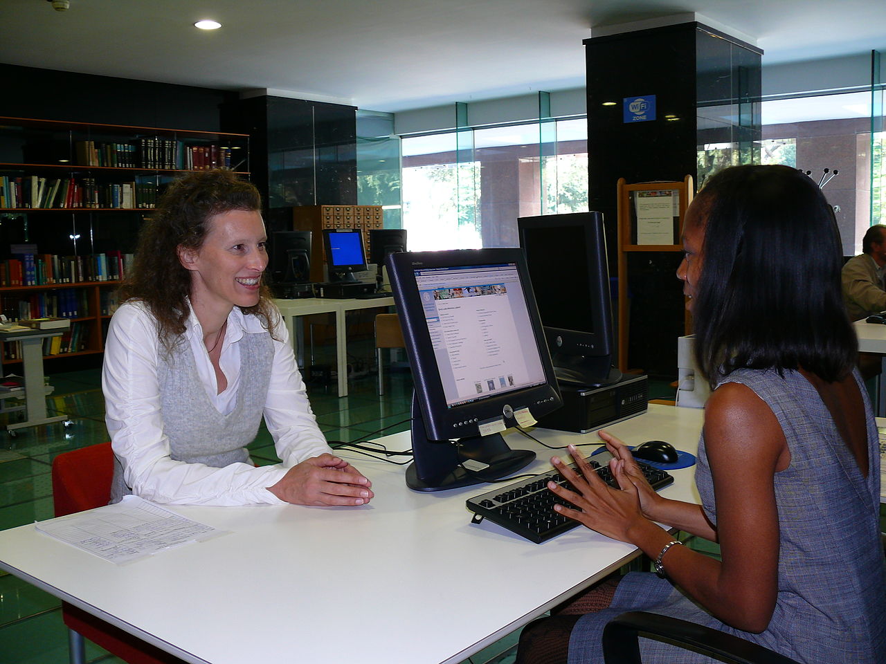 Reference librarian and patron