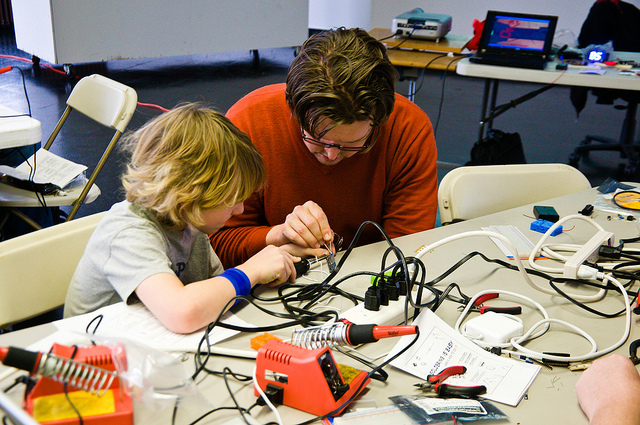 two people working in a workshop