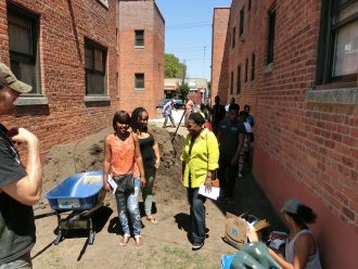 Members of an English class and a local gardening club worked together to convert a plot of land into a garden near  the Queens Library in South Hollis. Photo Courtesy of Kacper Jarecki