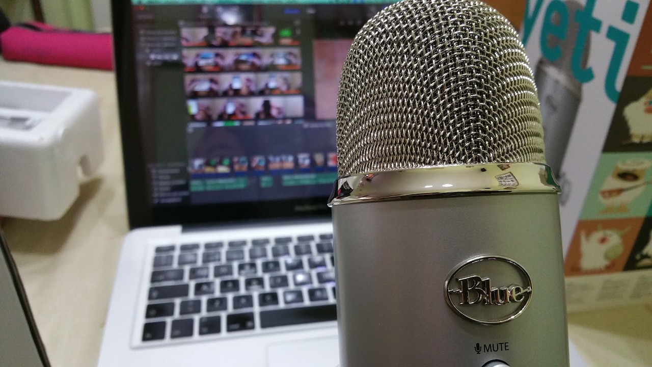 Microphone in front of a laptop screen