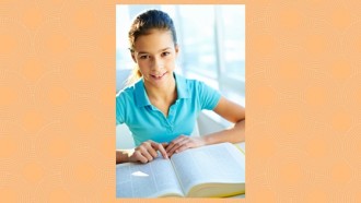 girl using large reference book