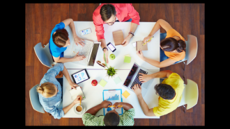 people around table meeting