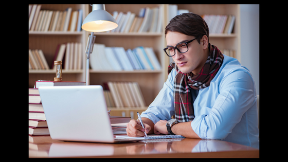 person at library working on computer